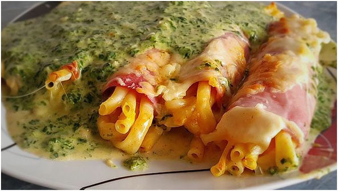Spinatauflauf mit gefüllten Schinken-Käse Röllchen