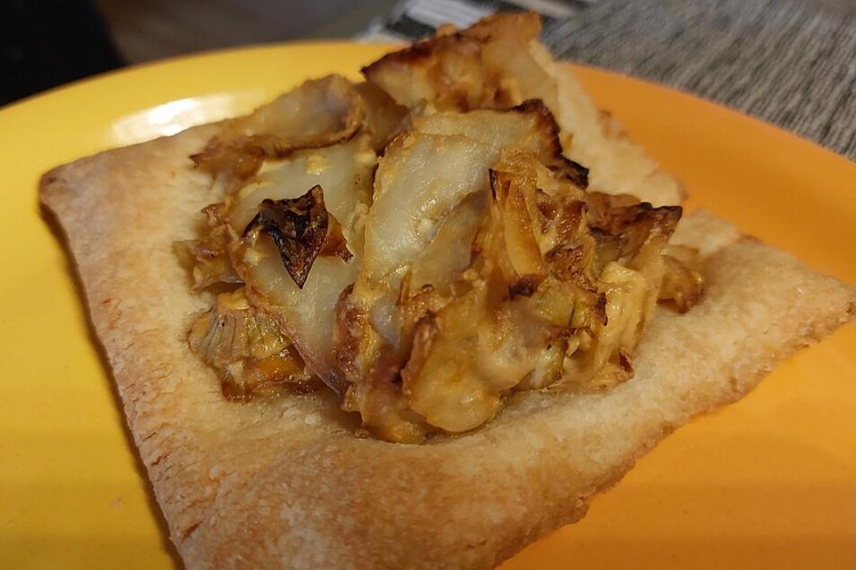 Blätterteig mit Spitzkohl – Frischkäse Haube Blätterteig mit Spitzkohl